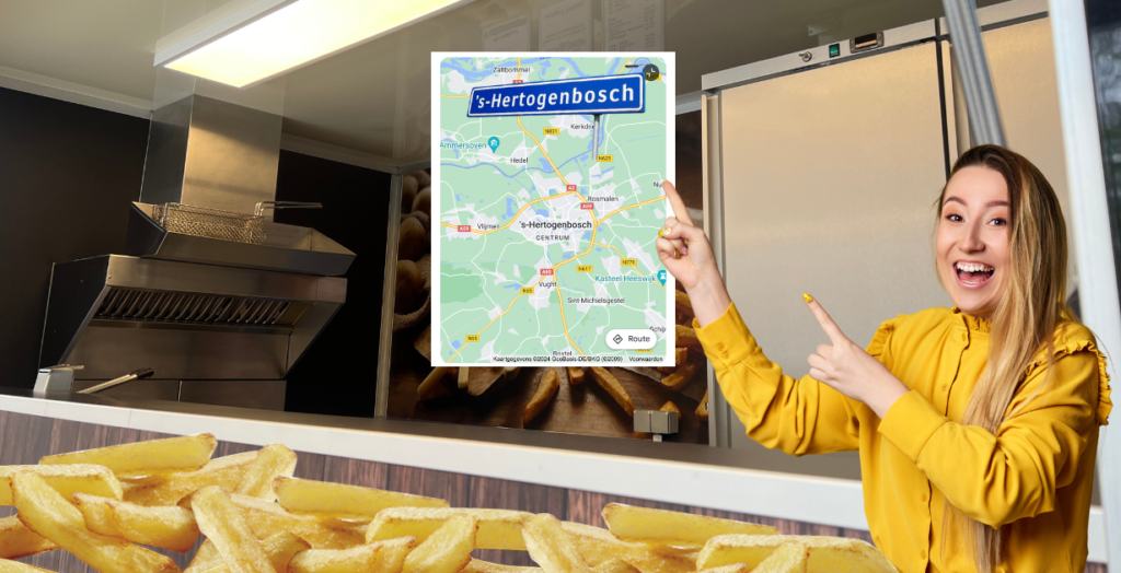 Frietkar huren in Den Bosch, Vrouw wijst naar een kaart van Den Bosch in de Frietkar. 